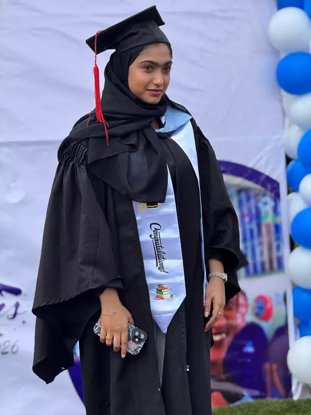 Graduate smiles and excitement