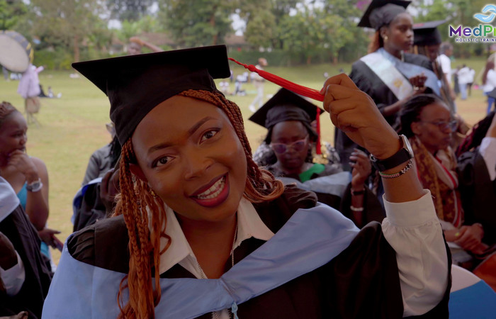 A male student in a lab coat