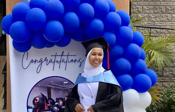 A group of medical students in a classroom setting.