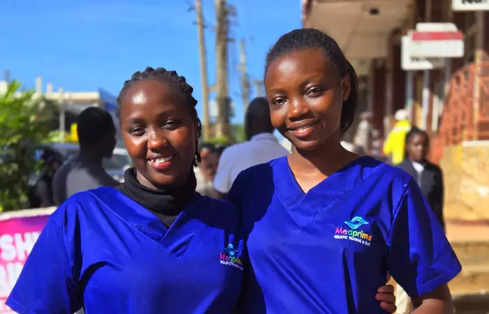 A group of medical students in a classroom setting.